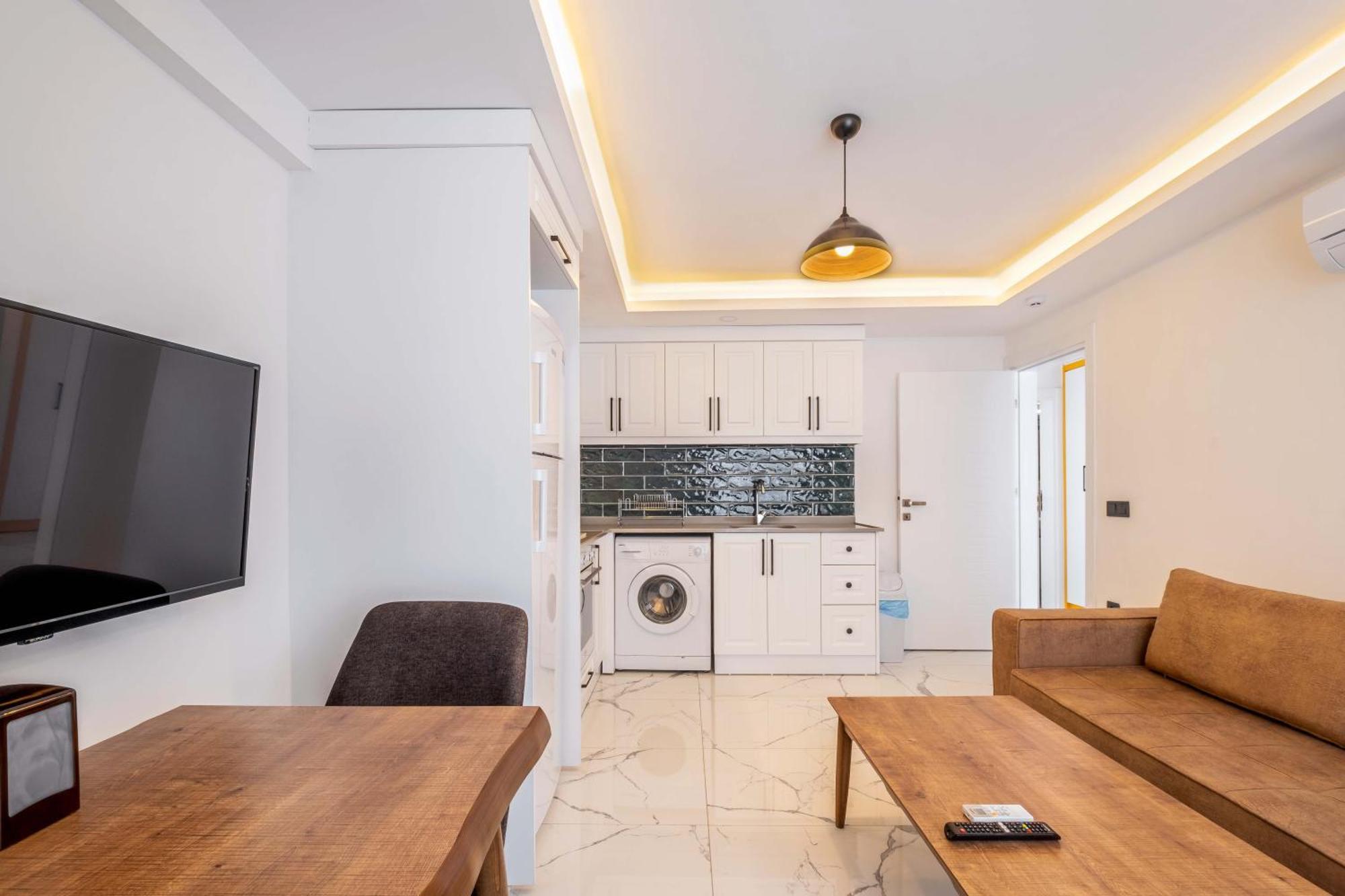 Yosun Apart Kaş Luaran gambar