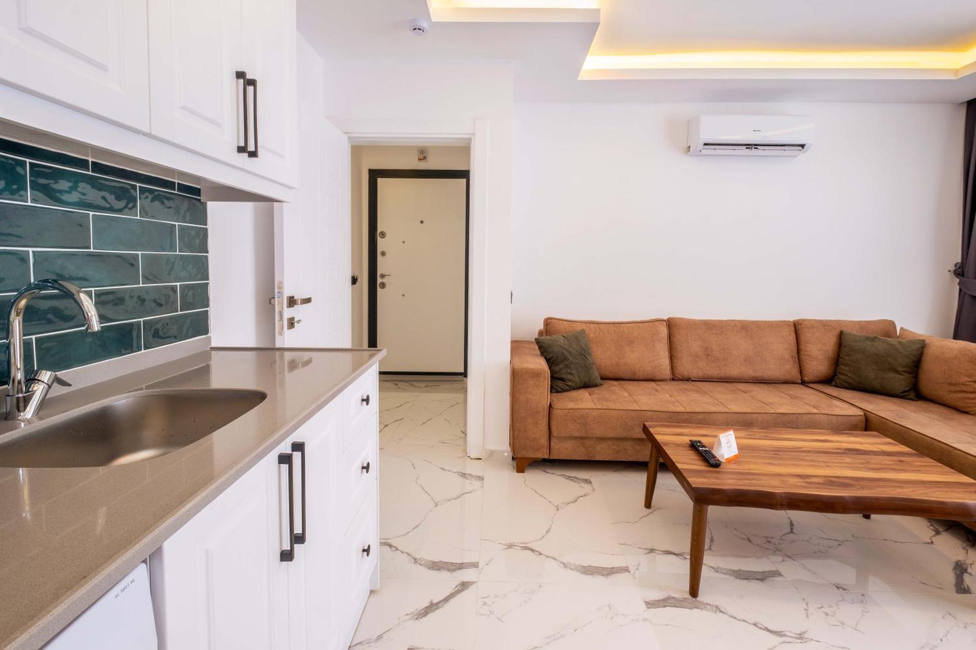 Yosun Apart Kaş Luaran gambar
